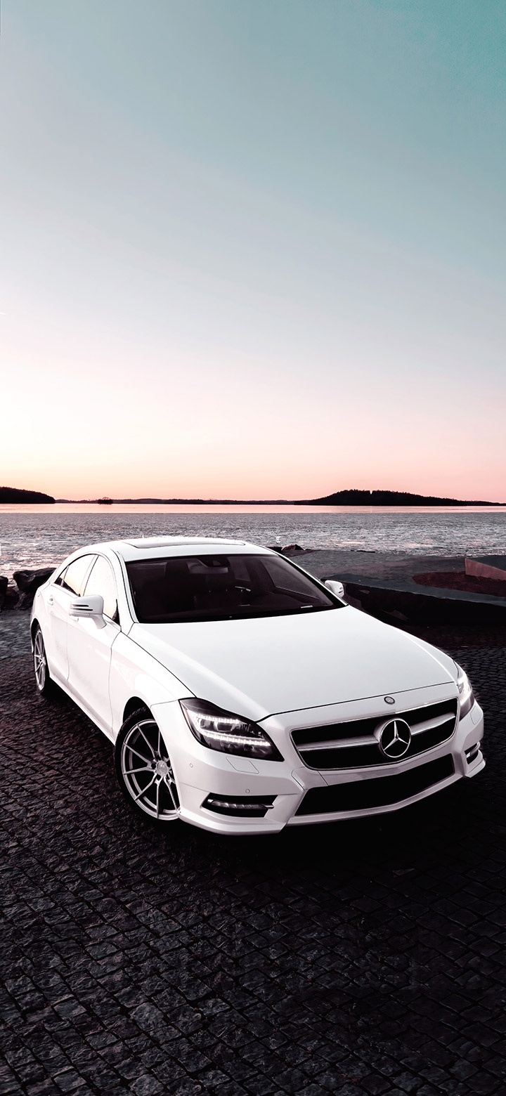 wallpaper of White Mercedes Cls Parked Near Sea