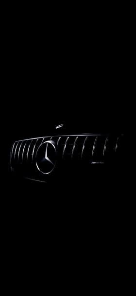 Phone Wallpaper Of Mercedes Grill On A Black Background
