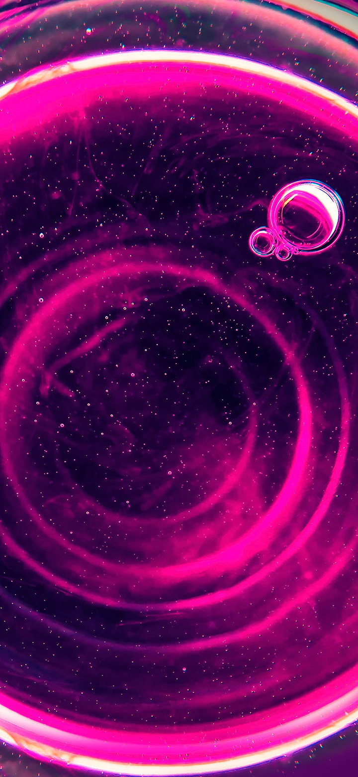 wallpaper of air bubble trapped in pink liquid