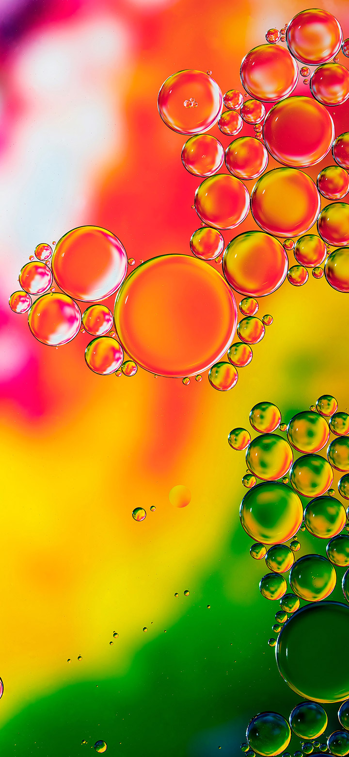 wallpaper of Bubbles In Orange And Yellow Liquid
