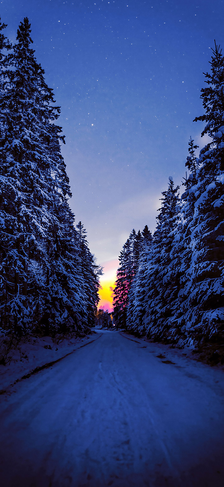 wallpaper of Dark Road Covered With Snow During Winter