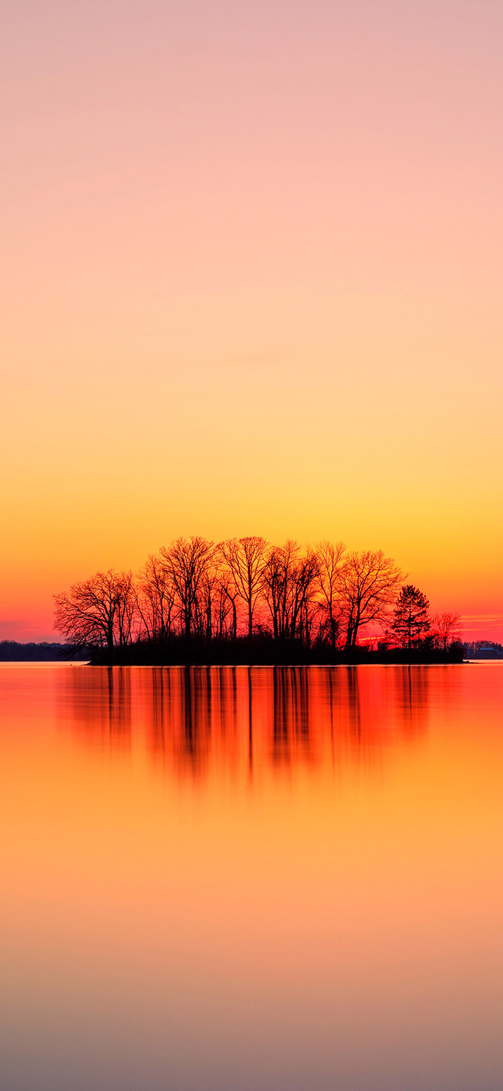wallpaper of Orange Sunset Over Body Of Water