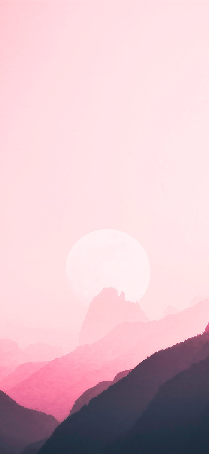 wallpaper of pink moon hiding behind mountains