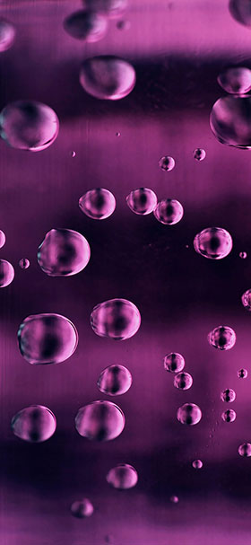 wallpaper of air bubbles stuck in purple liquid