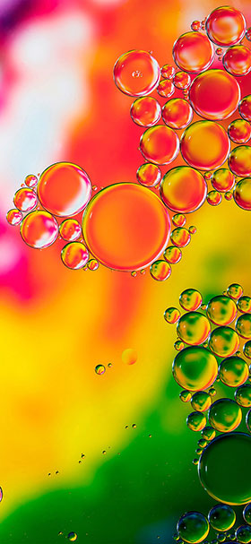 Phone Wallpaper Of Bubbles In Orange And Yellow Liquid