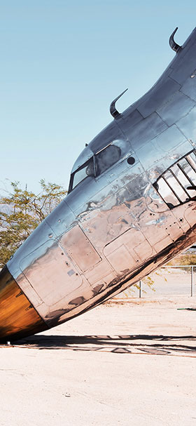 wallpaper of chrome plane crashes into sand