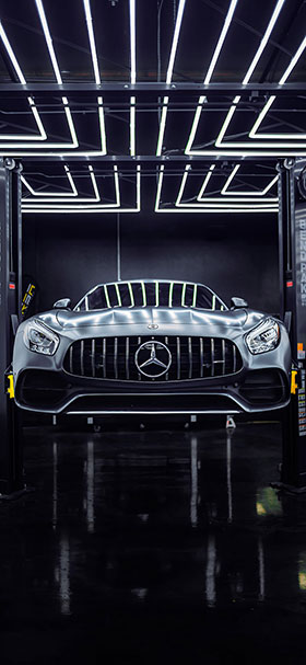 Lock Screen Wallpaper of Mercedes Inside Dark Workshop