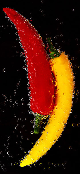 phone wallpaper of red and yellow fresh paprika