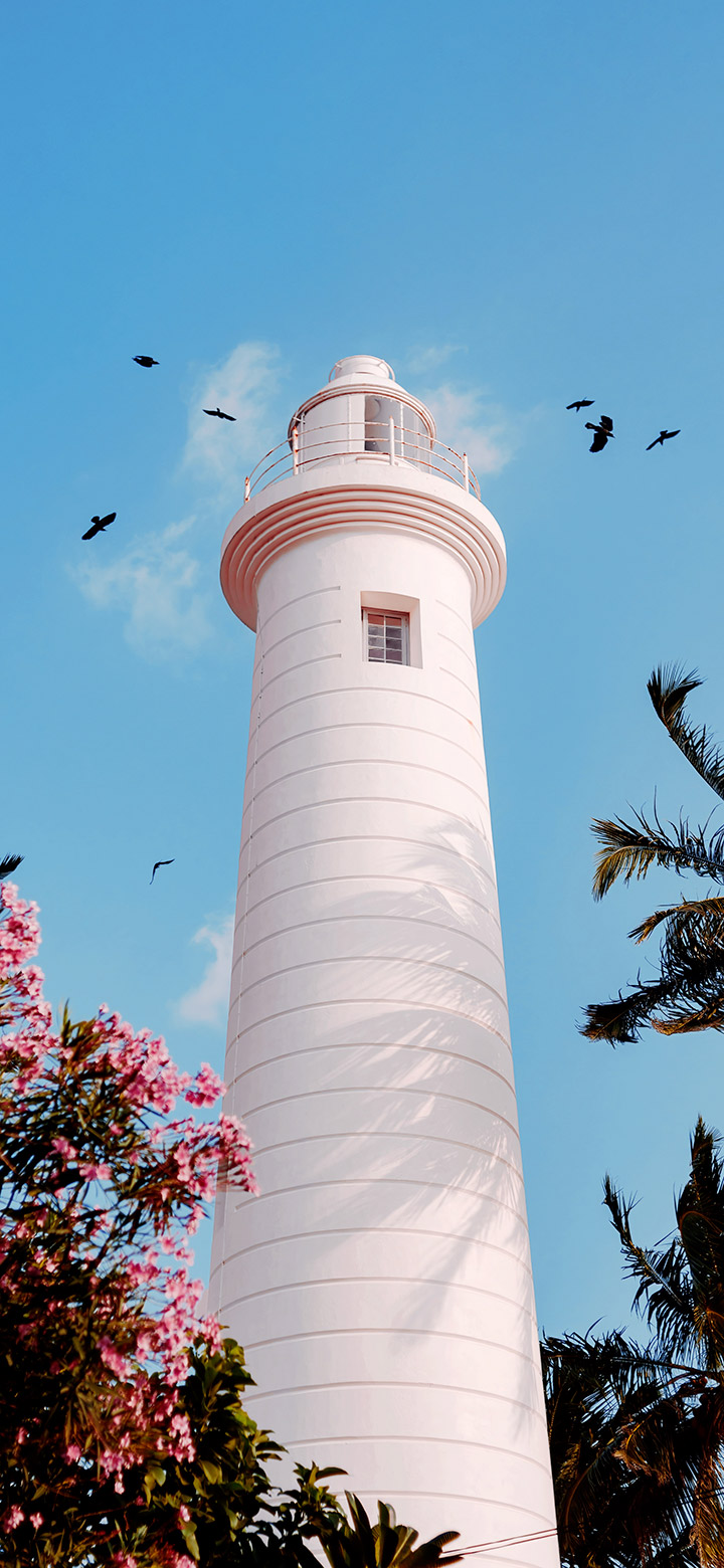 wallpaper of Aesthetic marine lighthouse during the early morning
