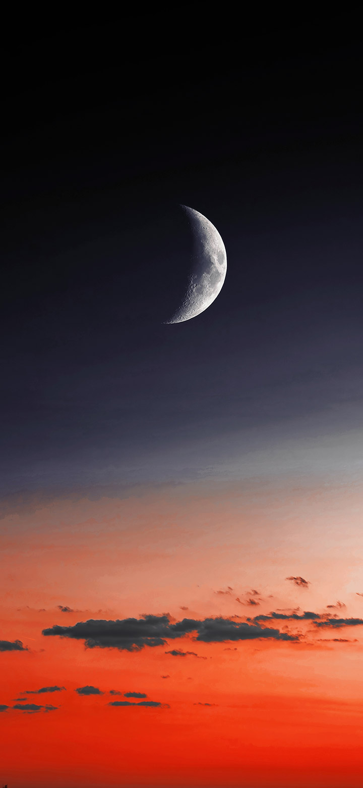 wallpaper of A half-full moon in a red sky