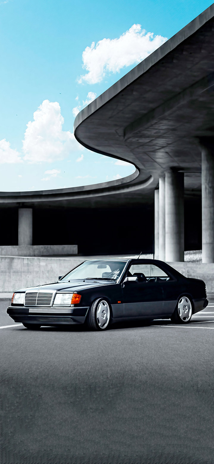 wallpaper of Classic Mercedes coupe near a concrete building