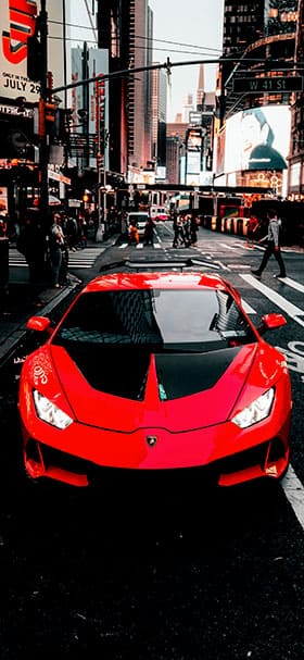 Phone Wallpaper of Red Lamborghini in New York street