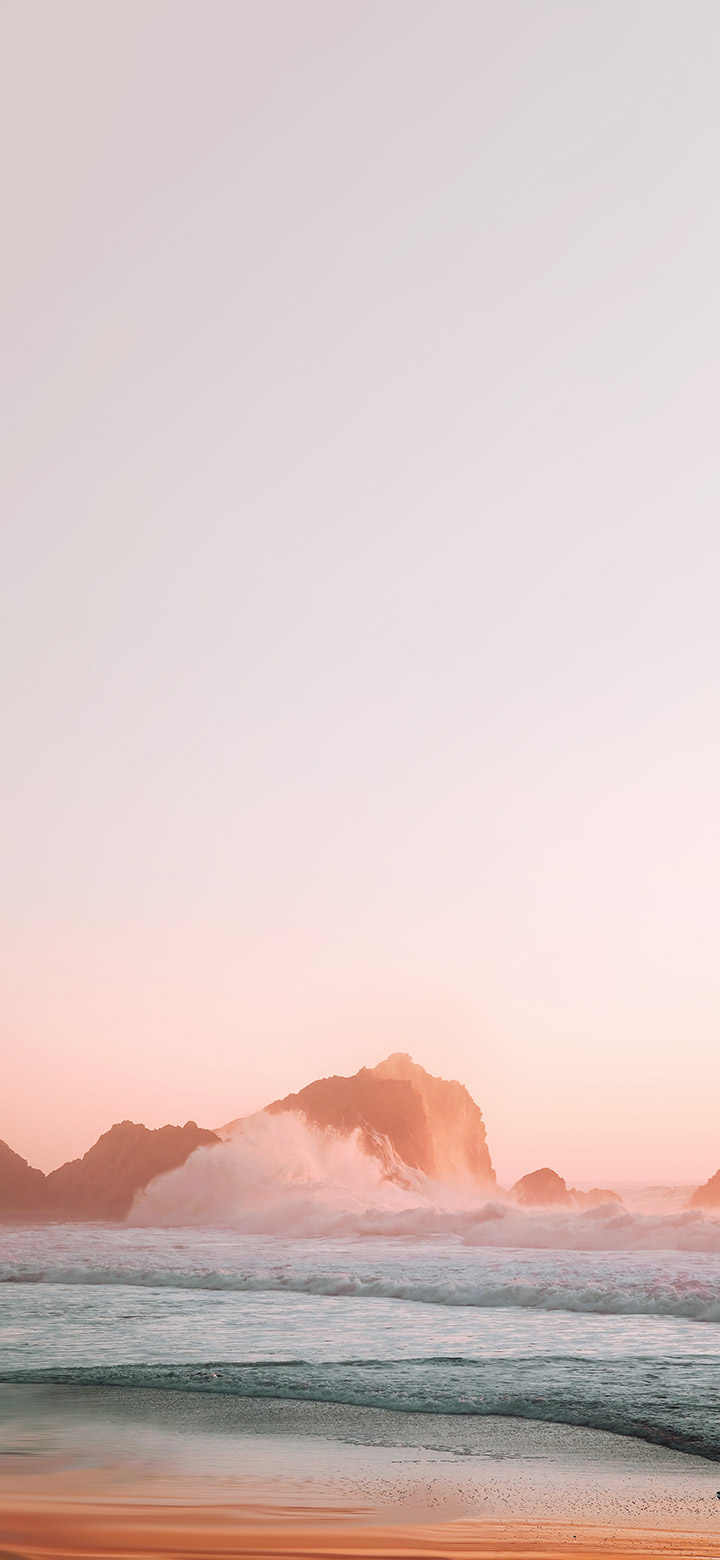 wallpaper of charming sea waves beside orange sand