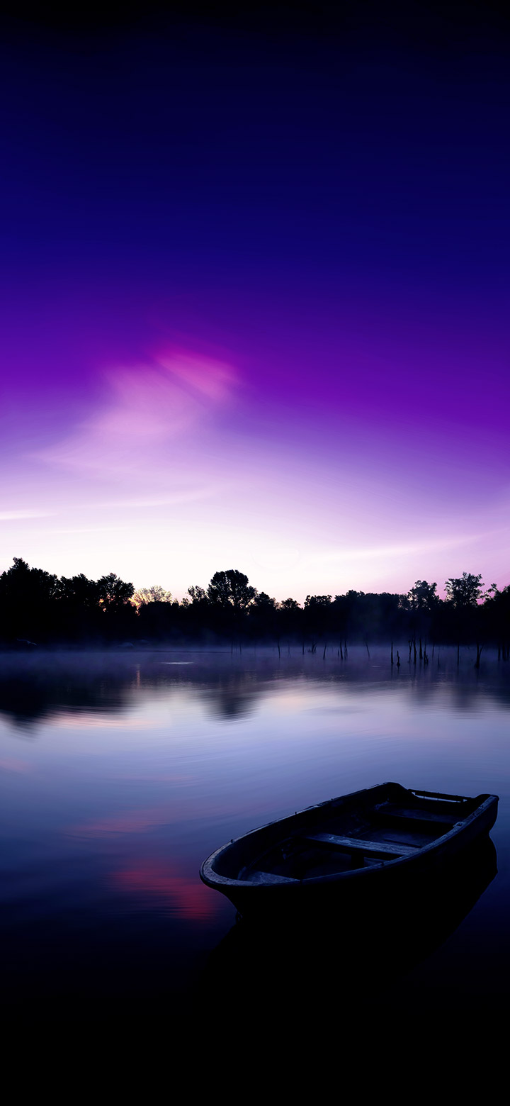 wallpaper of small boat floating on a dark lake