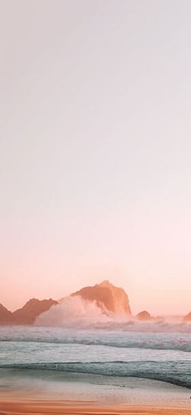 Phone Wallpaper of Charming sea waves beside orange sand