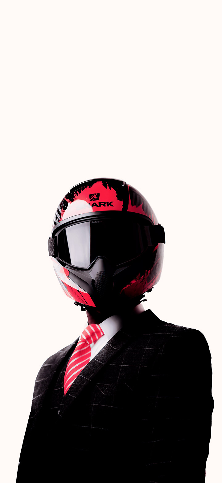 wallpaper of man wearing a motorcycle helmet