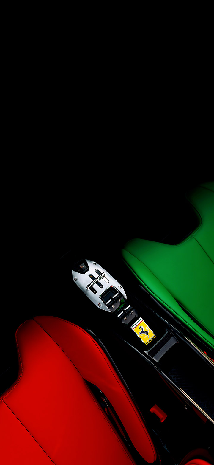 wallpaper of red and green seats of a ferrari