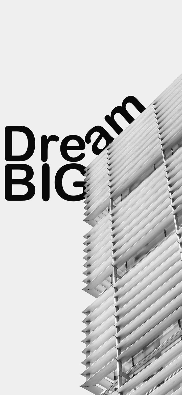 wallpaper of dream big text beside a modern building