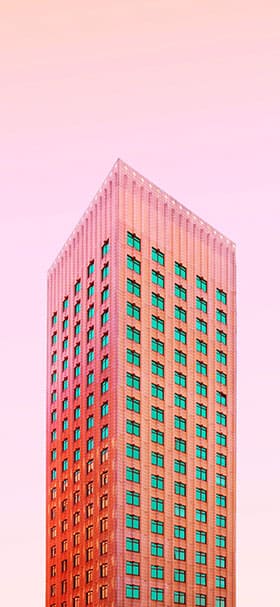 Phone Wallpaper of Tall Pink Building With Tiny Windows
