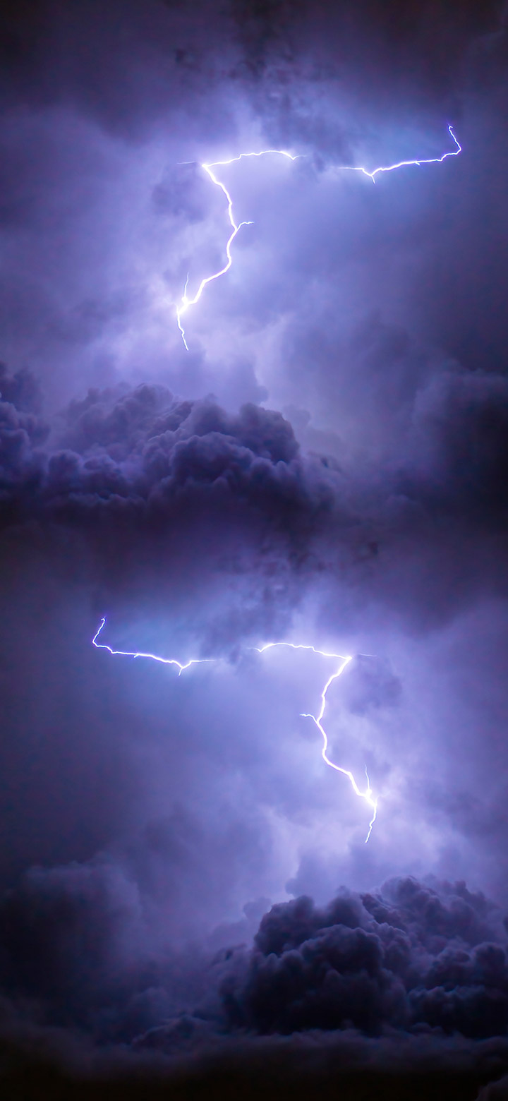 wallpaper of Lightning Strike Through Purple Clouds