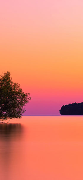 Lock Screen Wallpaper of Sunset Over Calm Body Of Water