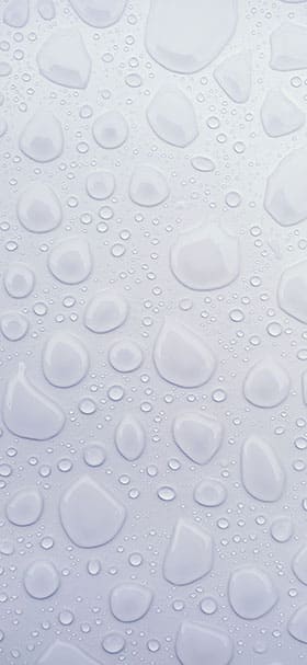 Phone Wallpaper of Drops Of Water On A White Surface