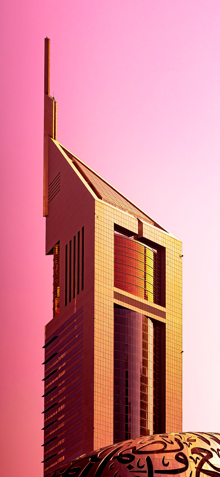 wallpaper of Cool Golden Tower Against Pink Sky